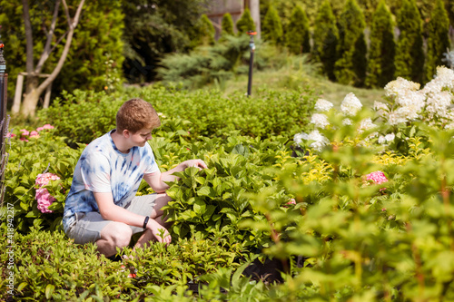 Fotografie Summer part-time job for teenager during vacation