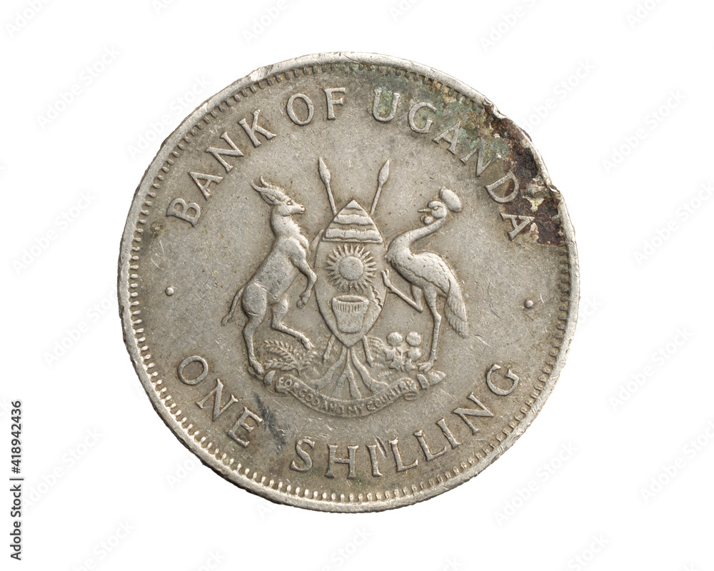 A Uganda coin shilling on a white isolated background A Uganda coin shilling on a white isolated background