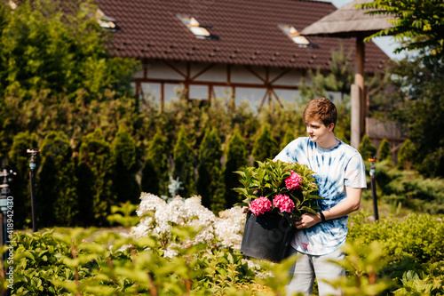 Fotografie Summer part-time job for teenager during vacation