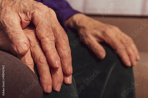 Fototapeta Naklejka Na Ścianę i Meble -  Elderly marriage couple. Close up aged hands.