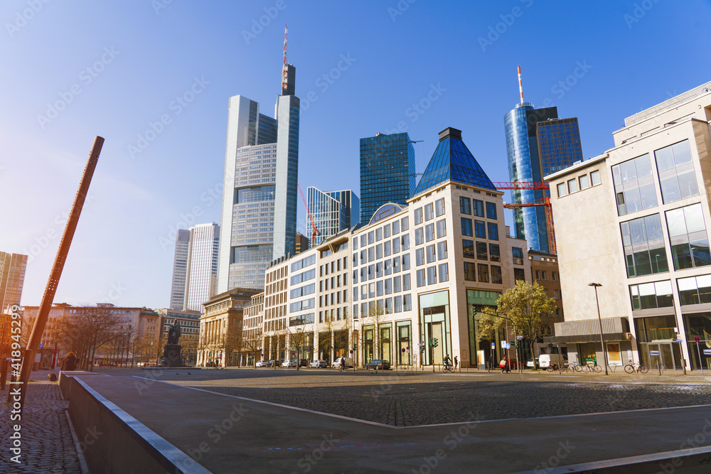 City street with empty road and morning light in Europe, Frankfurt am Main