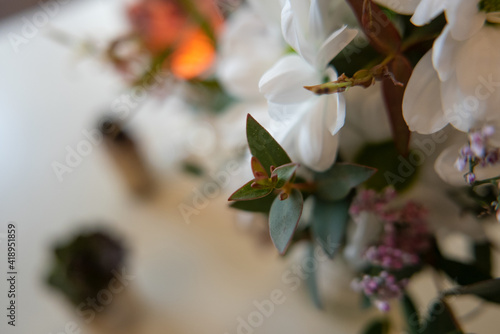 Wedding decoration in the restaurant flowers white and purple