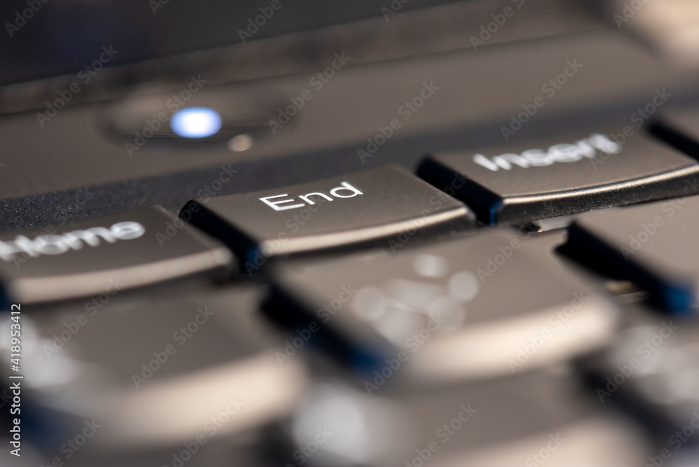 Macro shot of black keyboard focus on end key. Macro shot of black keyboard focus on end key.