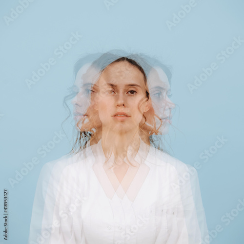 Calm woman. Triple exposure portrait. She's facing three different directions photo