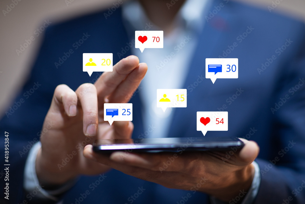 holding social media icons with smart phone holding social media icons with smart phone