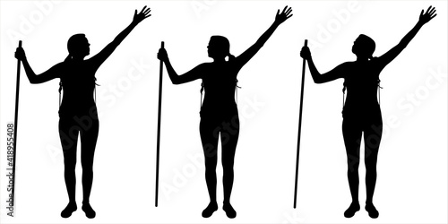 Girl, woman looks up, stands still with his hands up for joy, success, victory. Climber, tourist, hiker with walking stick, backpack on back. Black female silhouette with the tail of hair on the head.