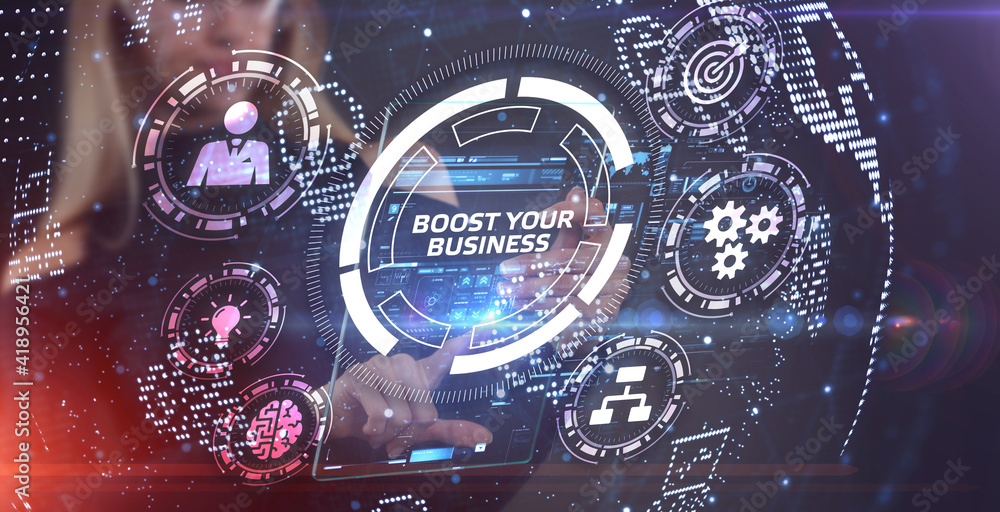 Fototapeta premium Business, Technology, Internet and network concept. Young businessman shows the word: Boost your business
