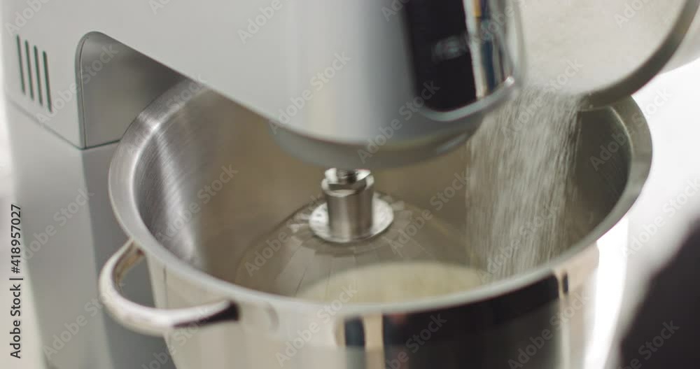 Preparation Of Dough With Professional Kneader Machine. Whipping Egg Whites With Sugar In Food Processor. Chef Adding Sugar To The Bowl Of Modern Silver Kitchen Stand Mixer, Mixing Dough For Macarons