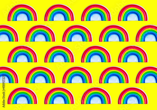 Rainbow pattern on yellow background. Gay pride concept