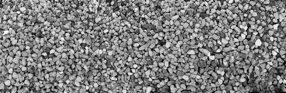 gravel stone texture. grey background with textured rock surface. ancient outdoor construction nuance. abstract rough material. gravel stone texture. grey background with textured rock surface. ancient outdoor construction nuance. abstract rough material.