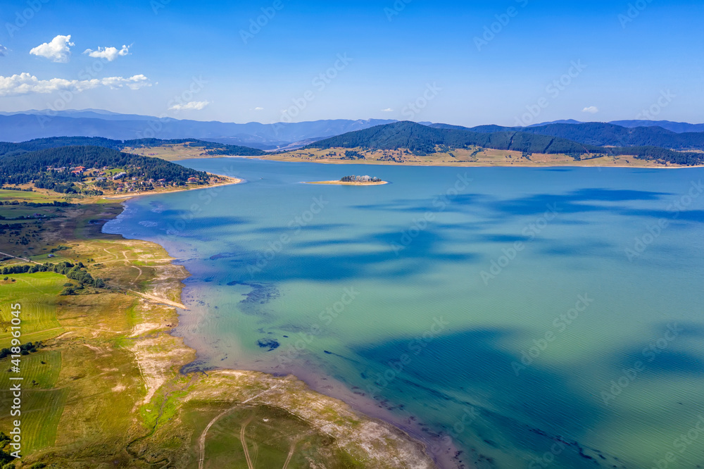 Scenic aerial view with a drone of an amazing Batak dam, Bulgaria with crystal water