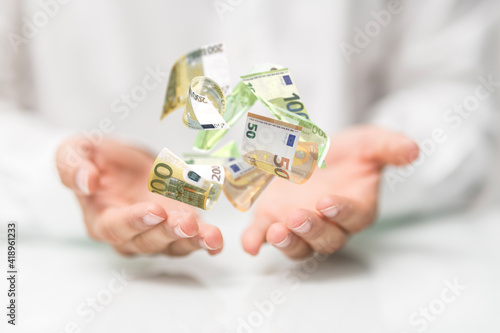 capital euro banknote in ha...