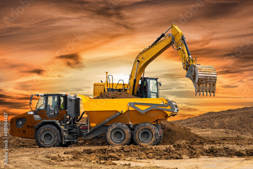 Foto excavator at work on construction site
