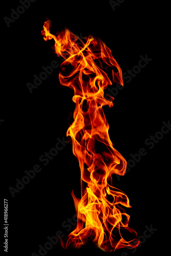 Fire flame isolated on black isolated background - Beautiful yellow, orange and red and red blaze fire flame texture style. © lukyeee_nuttawut