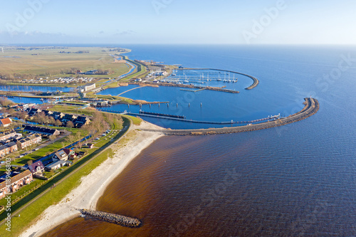 Aerial from the harbor and city Stavoren at the IJsselmeer in the Netherlands photo