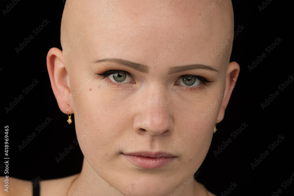 Young urban woman with blue eyes and a fair complexion poses for the camera. Young urban woman with blue eyes and a fair complexion poses for the camera.