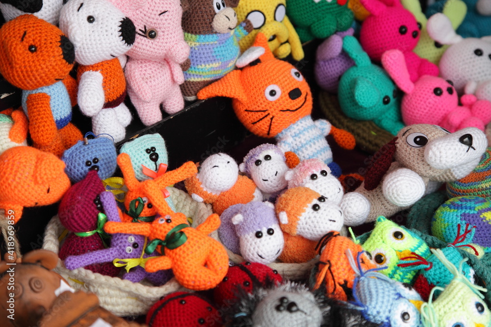 A many colored cute fluffy animals toys