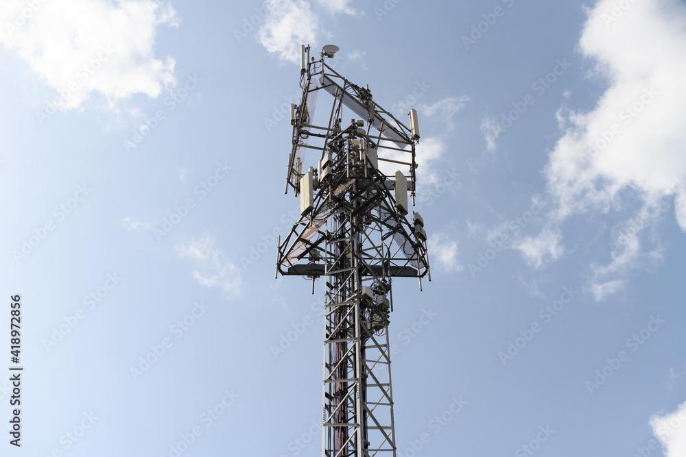 Telecommunications tower with antennas Telecommunications tower with antennas