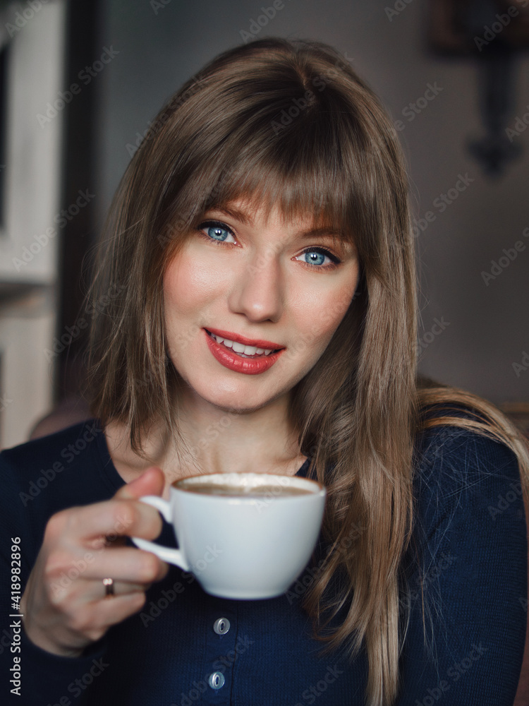 custom made wallpaper toronto digitalClose up Image of young blonde pretty woman with blue eyes cup of coffee enjoying life in trendy city cafe vertical portrait for social platform stories