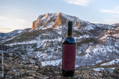 Wine in nature in the snow