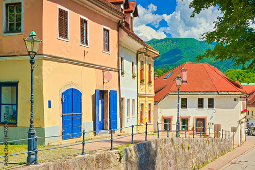 A street with old colorful houses in the small European historical town of Kamnik, Slovenia photo