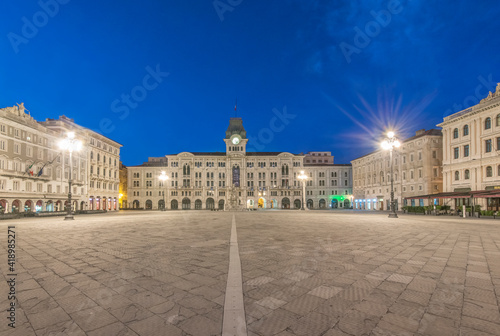 The empty piazza of Unity of Italy square, Trieste, historic buildings.