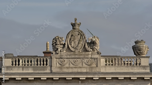 Photography Detail of Custom house in neoclassical style , with a lion and unicorn around a