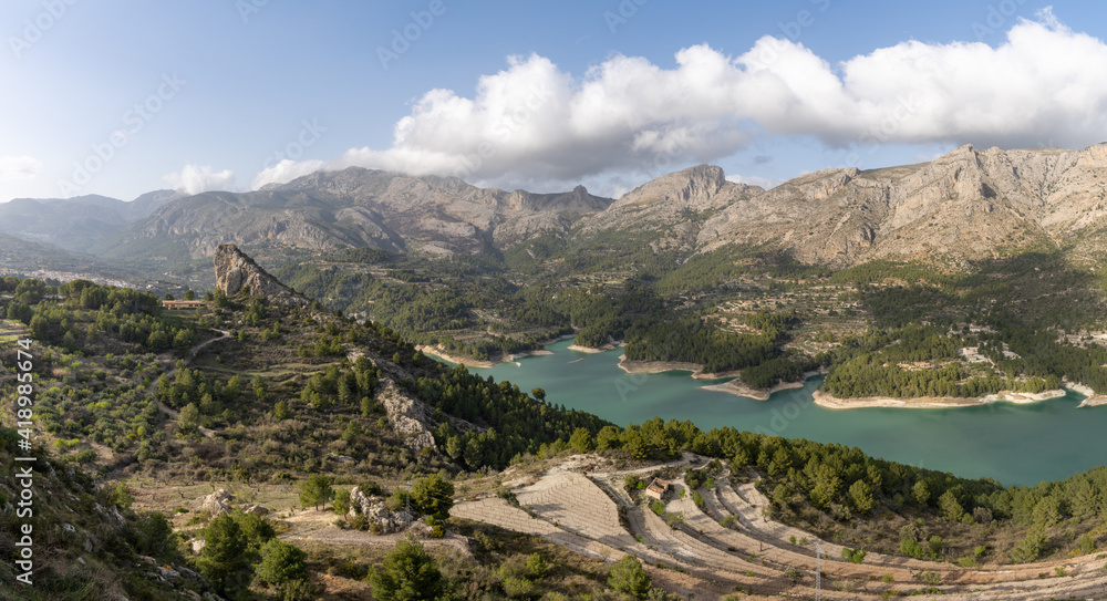 panorama view of the Guadalest Reservoir and Sierra de Serella mountains in Spain