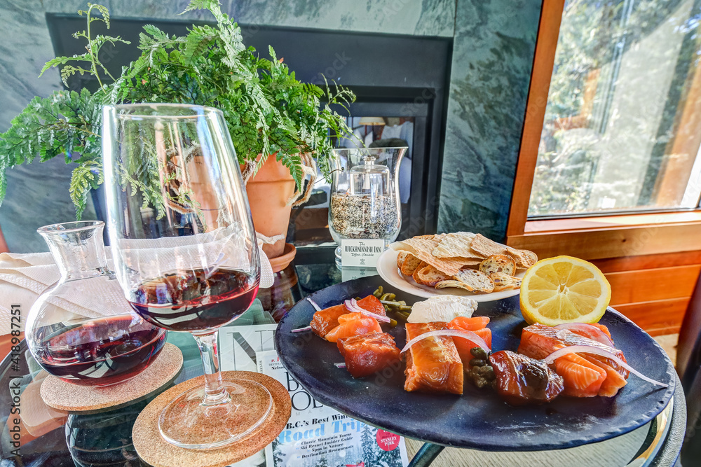 Fototapeta premium Tofino, British Columbia - March 8, 2018: The welcome amenity including different types of smoked salmon at the Wickaninnish Hotel in Tofino British Columbia