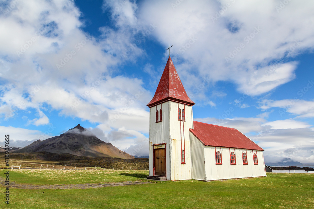 Church with red roof in Hellnar on a sunny summer day, Snaefellsnes peninsula in Iceland
