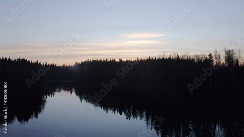 Flying over the frozen river photo