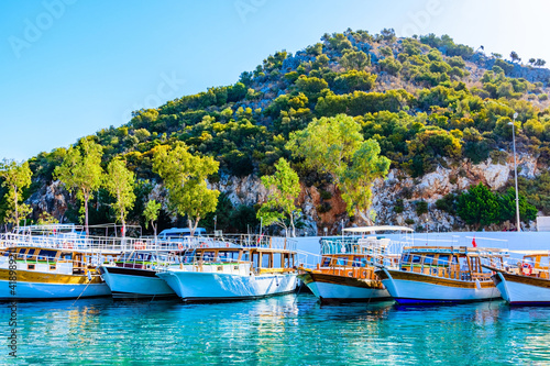 Modern luxury yachts moored at the harbor. Summer vacation