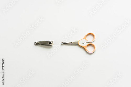 Systems for caring for and cutting different nails, a nail clipper and hygienic scissors.