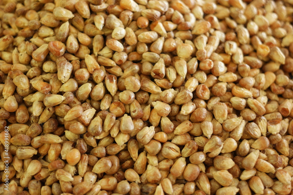 Heap of peeled peanuts close up. Roasted peeled peanuts background. Heap of peeled peanuts close up. Roasted peeled peanuts background.
