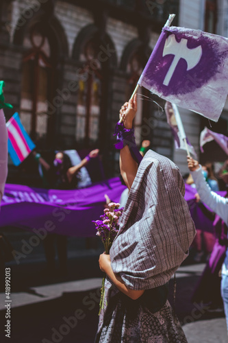 Puebla, Mexico - March 7, 2021: On the way to 8M, a feminist demonstration to commemorate International Women's Day, they demand the decriminalization of abortion in Puebla. photo