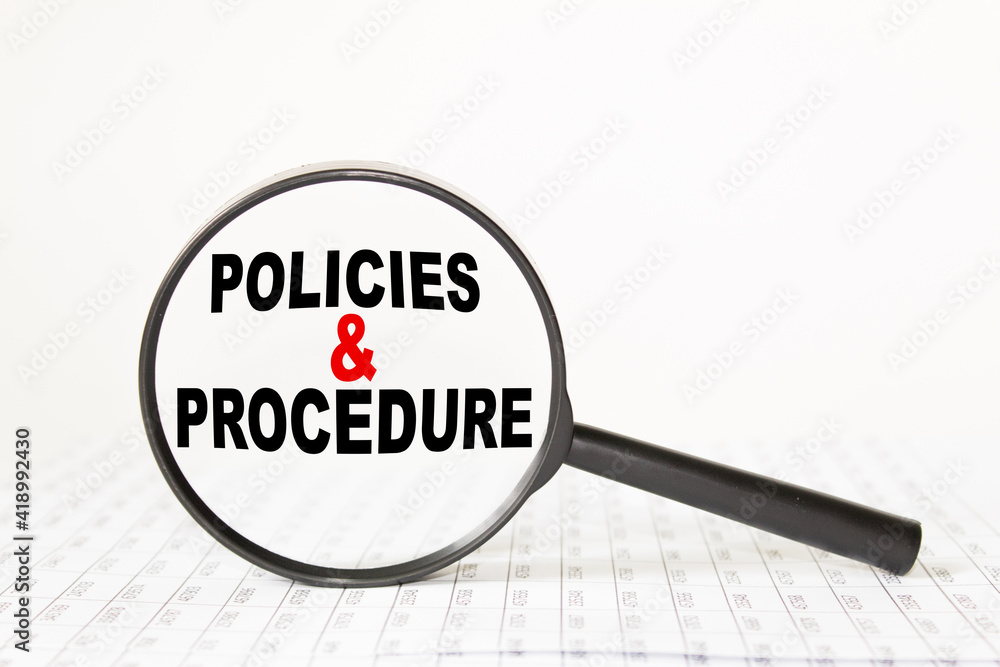 words POLICIES AND PROCEDURE in a magnifying glass on a white background. business concept words POLICIES AND PROCEDURE in a magnifying glass on a white background. business concept