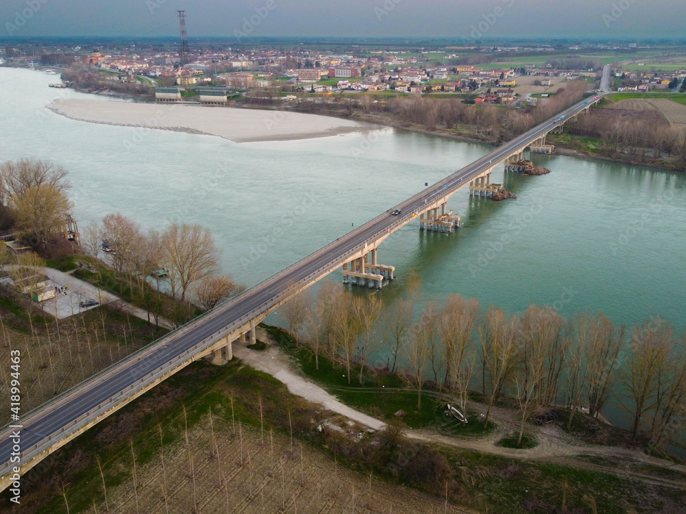 aerial view of the viadana Boretto bridge over the po river, italy