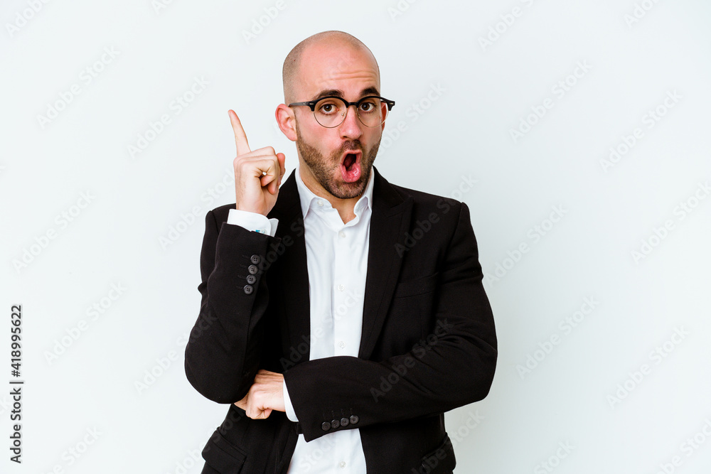 Young business caucasian bald man isolated on blue background having some great idea, concept of creativity. Young business caucasian bald man isolated on blue background having some great idea, concept of creativity.