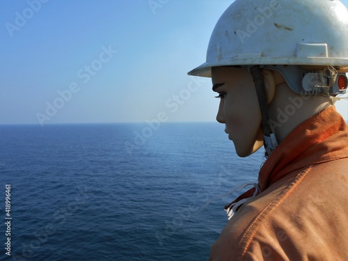 View of the dummy placed on board the shipside of a merchant vessel underway at sea in piracy-affected areas.  photo