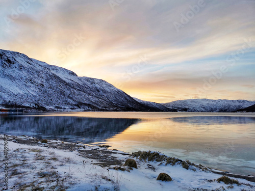 Lake in Kattfjorden, Tromso at sunset photo