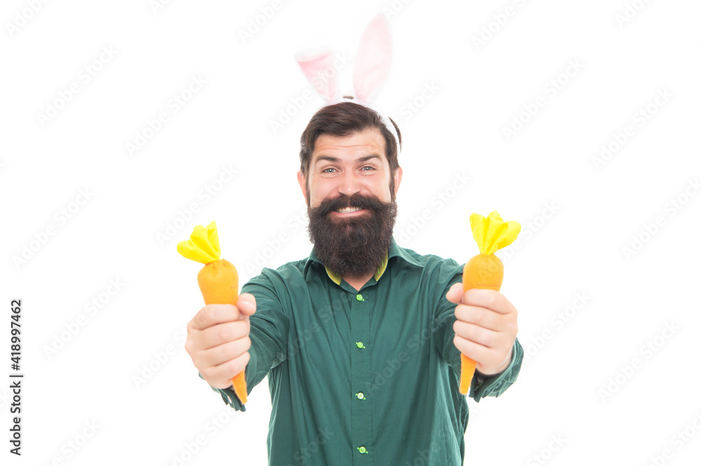 happy bearded man wear funny bunny ears on easter holiday hold carrot isolated on white, easter happy bearded man wear funny bunny ears on easter holiday hold carrot isolated on white, easter
