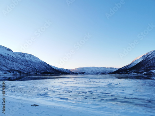 Snowy landscape in Kattfjorden, Tromso, Norway photo