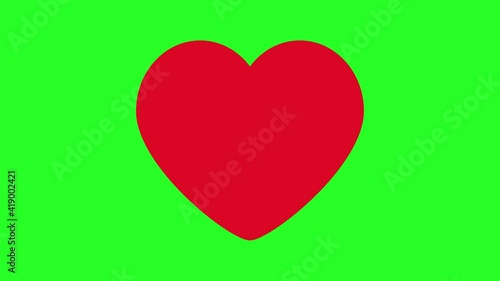 Heartbeat animation. Red heart icon beating on green background. Heart beating symbol.