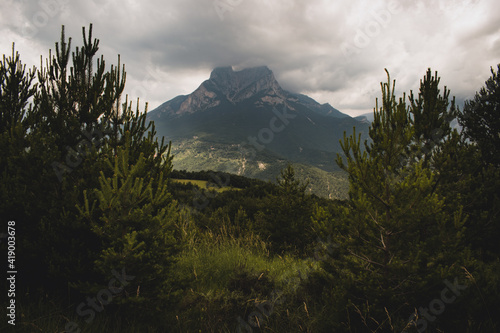 Landscape of trees and greenery with Pedraforca mountain background in Spia photo