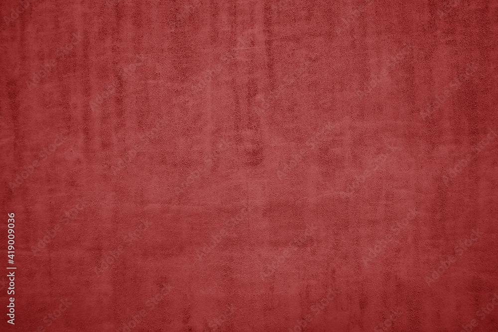 Fototapeta premium The texture of red natural Italian leather with a pile. red background.