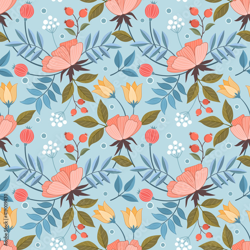 Pink and yellow flowers on a light blue color seamless pattern for fabric textile background  wrapping paper  and backdrop.