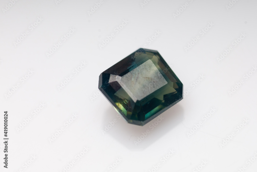 Natural stone sapphire on a white background Natural stone sapphire on a white background