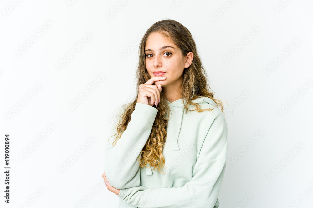 Young caucasian woman thinking and looking up, being reflective, contemplating, having a fantasy. Young caucasian woman thinking and looking up, being reflective, contemplating, having a fantasy.