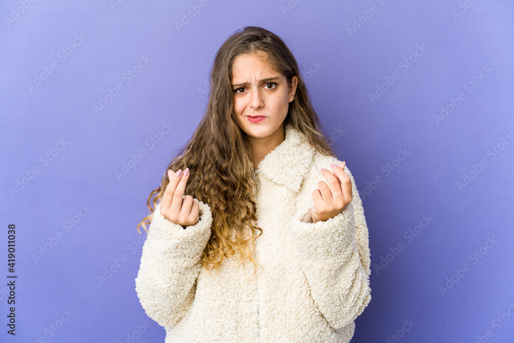 Young caucasian cute woman showing that she has no money. Young caucasian cute woman showing that she has no money.