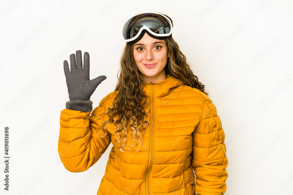 Young caucasian snowboarder woman isolated smiling cheerful showing number five with fingers.